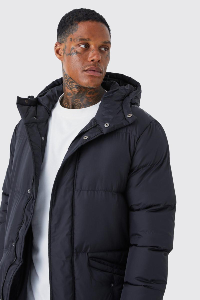 Пуховик середньої довжини з капюшоном чорного кольору