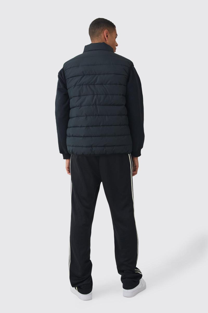 Чорний стьобаний безрукавний жилет на блискавці