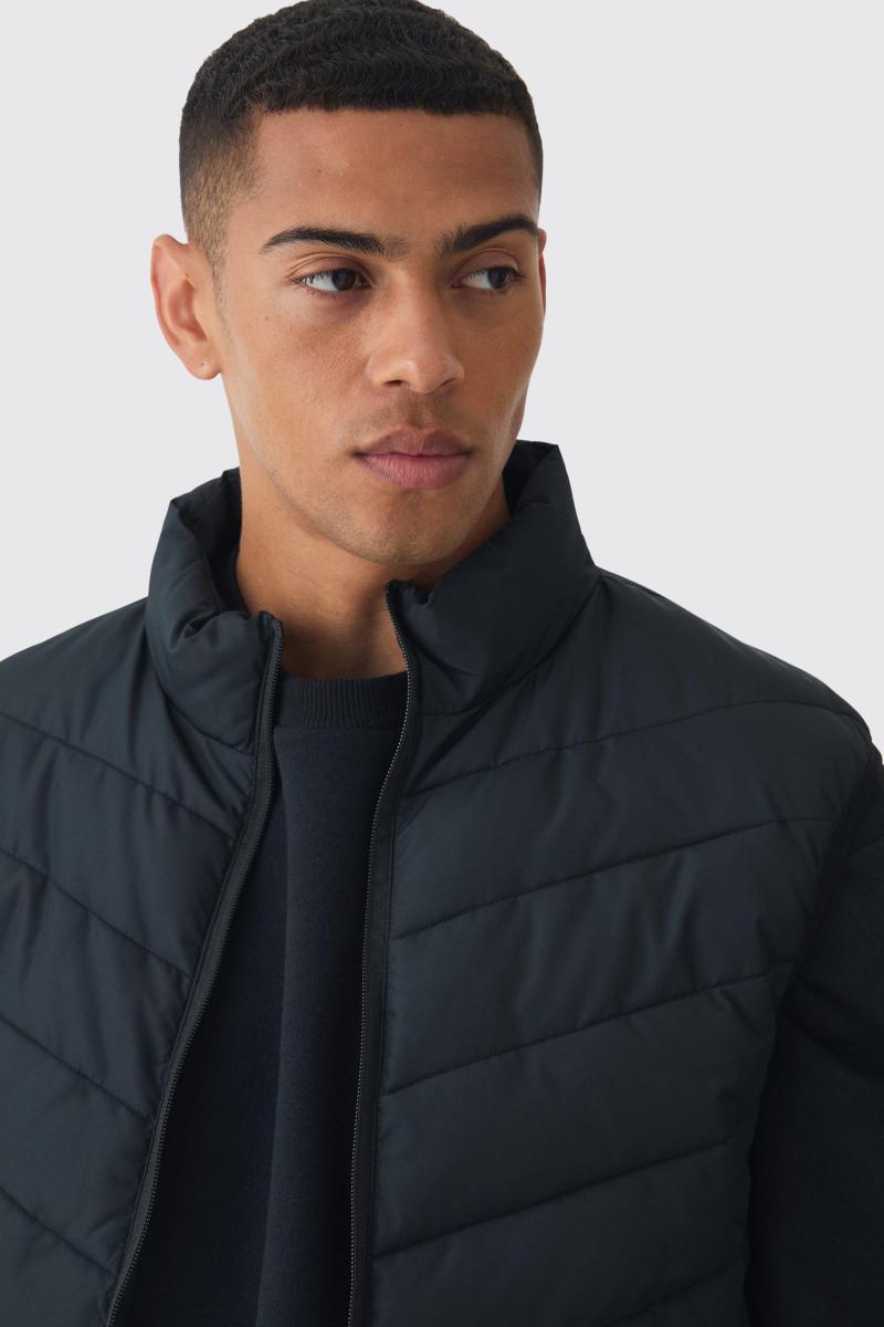 Чорний стьобаний безрукавний жилет на блискавці