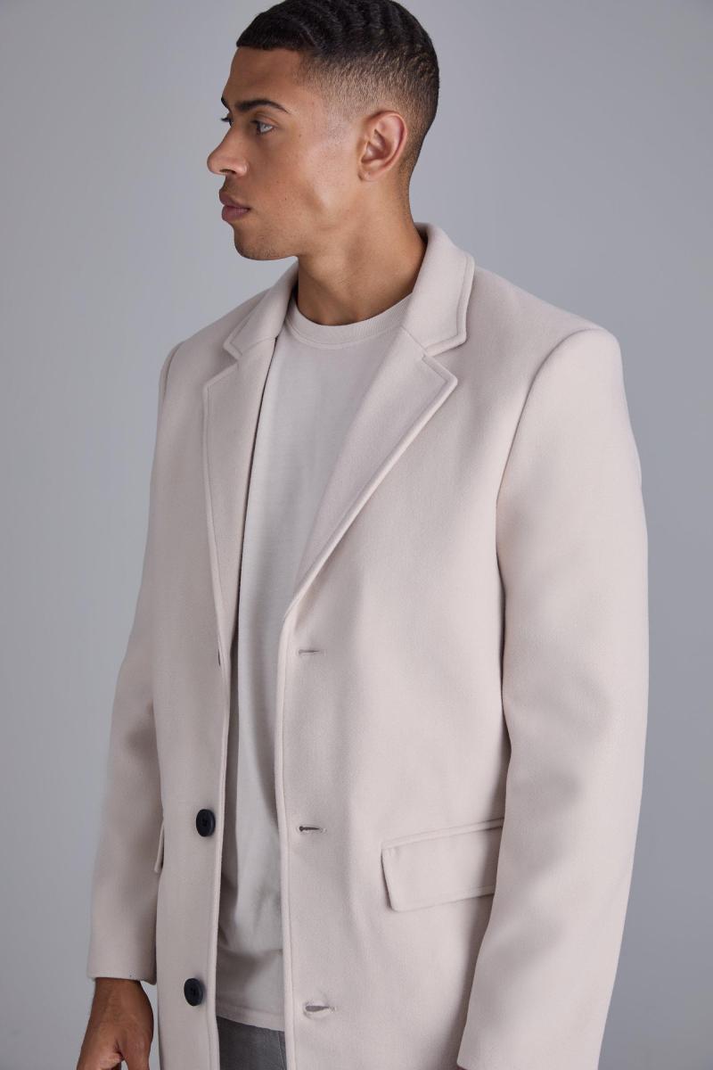 Однобортне вовняне пальто бежевого кольору