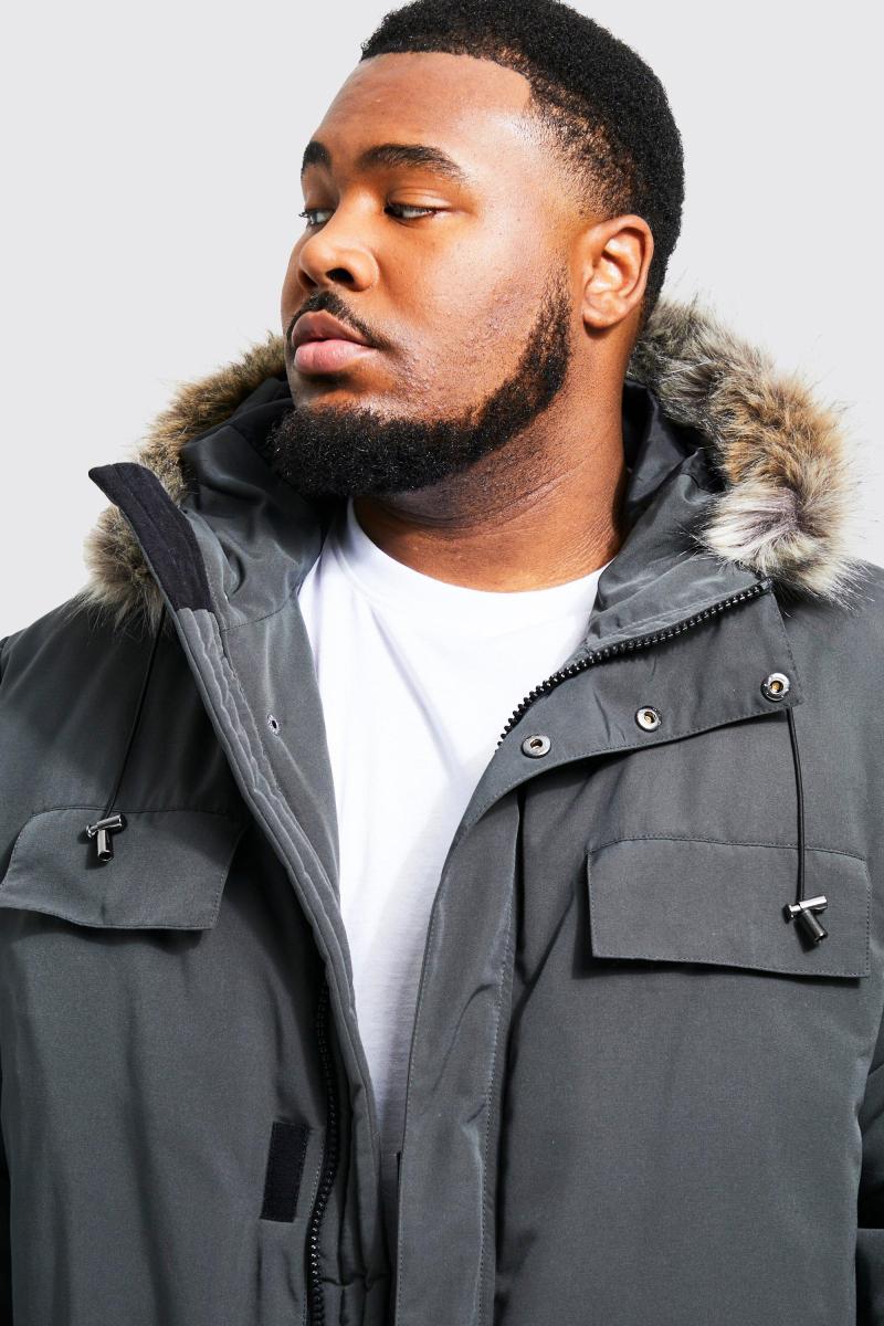 Крім того, вугільна куртка-парка з капюшоном зі штучного хутра