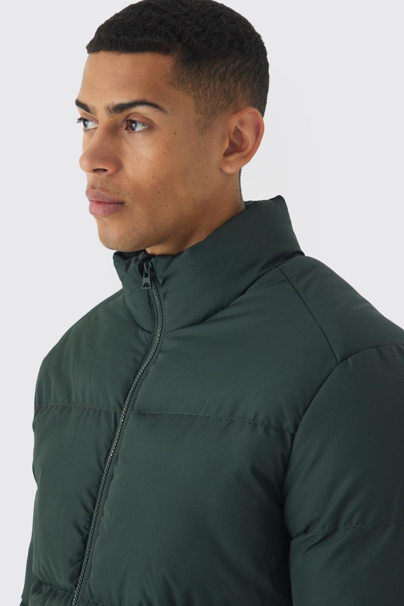 Пуховик кольору хакі з воронковим вирізом