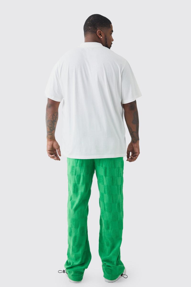 Висока футболка та штани з тисненням у клітинку