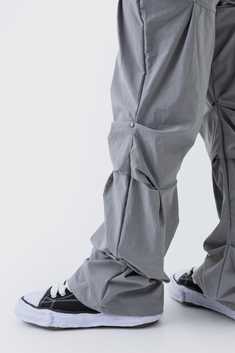 Штани приталеного кльошу з рюшами